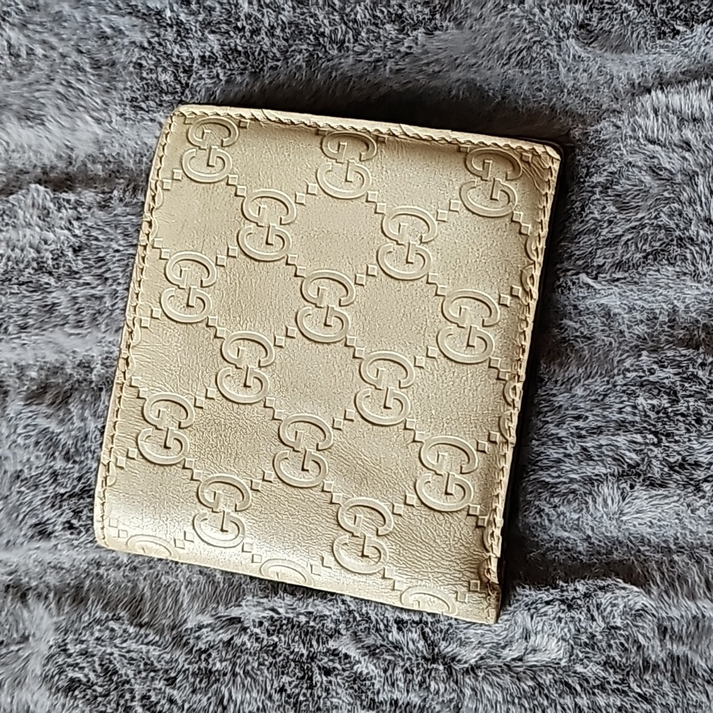 Gucci guccissima cream leather bifold wallet